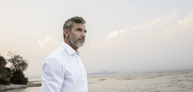 Man on holiday after cleaning his ears